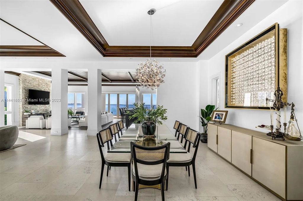 Discover the epitome of luxury waterfront living at 3590 Crystal View Court, Miami, Florida. This magnificent mansion offers 6 bedrooms, 10 bathrooms, and 13,930 square feet of living space on a spacious 0.45-acre lot.