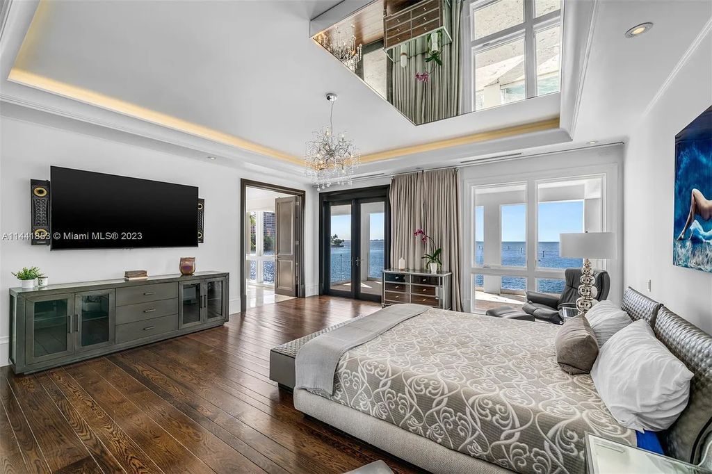 Discover the epitome of luxury waterfront living at 3590 Crystal View Court, Miami, Florida. This magnificent mansion offers 6 bedrooms, 10 bathrooms, and 13,930 square feet of living space on a spacious 0.45-acre lot.