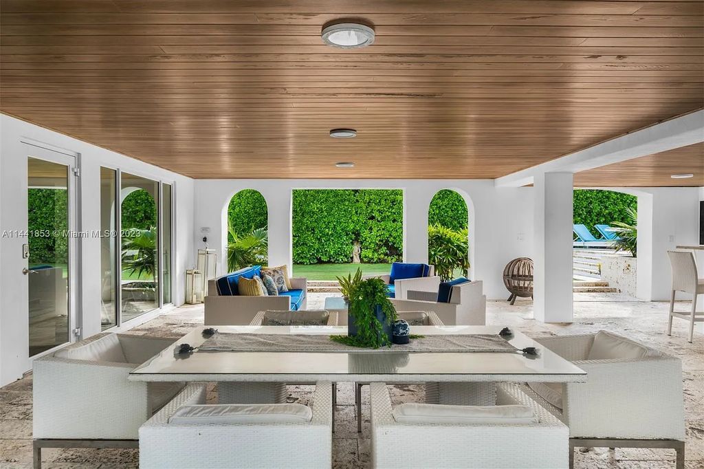 Discover the epitome of luxury waterfront living at 3590 Crystal View Court, Miami, Florida. This magnificent mansion offers 6 bedrooms, 10 bathrooms, and 13,930 square feet of living space on a spacious 0.45-acre lot.