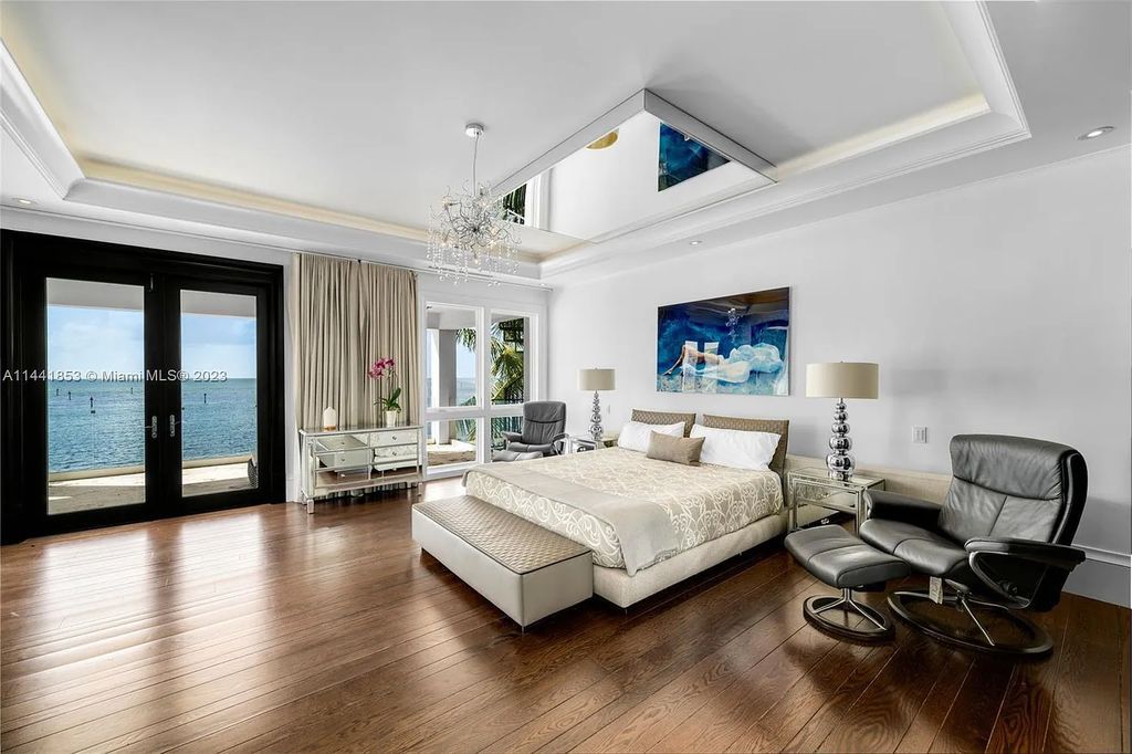 Discover the epitome of luxury waterfront living at 3590 Crystal View Court, Miami, Florida. This magnificent mansion offers 6 bedrooms, 10 bathrooms, and 13,930 square feet of living space on a spacious 0.45-acre lot.