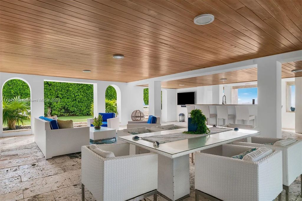Discover the epitome of luxury waterfront living at 3590 Crystal View Court, Miami, Florida. This magnificent mansion offers 6 bedrooms, 10 bathrooms, and 13,930 square feet of living space on a spacious 0.45-acre lot.
