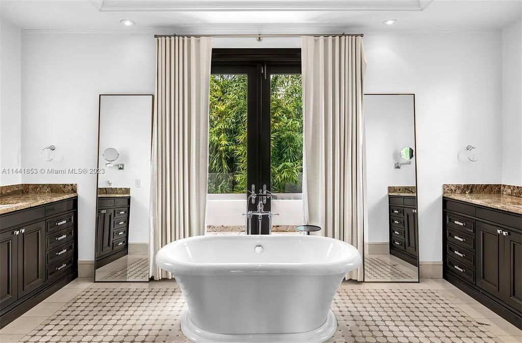 Discover the epitome of luxury waterfront living at 3590 Crystal View Court, Miami, Florida. This magnificent mansion offers 6 bedrooms, 10 bathrooms, and 13,930 square feet of living space on a spacious 0.45-acre lot.