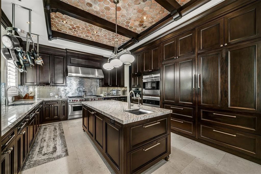 Discover the epitome of luxury waterfront living at 3590 Crystal View Court, Miami, Florida. This magnificent mansion offers 6 bedrooms, 10 bathrooms, and 13,930 square feet of living space on a spacious 0.45-acre lot.