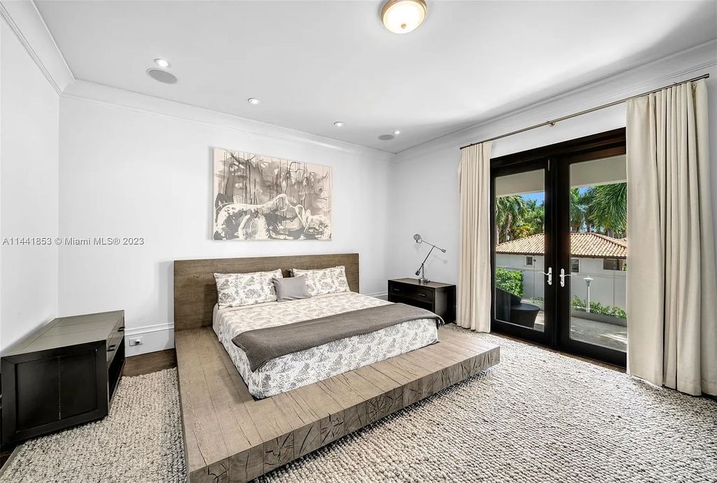 Discover the epitome of luxury waterfront living at 3590 Crystal View Court, Miami, Florida. This magnificent mansion offers 6 bedrooms, 10 bathrooms, and 13,930 square feet of living space on a spacious 0.45-acre lot.