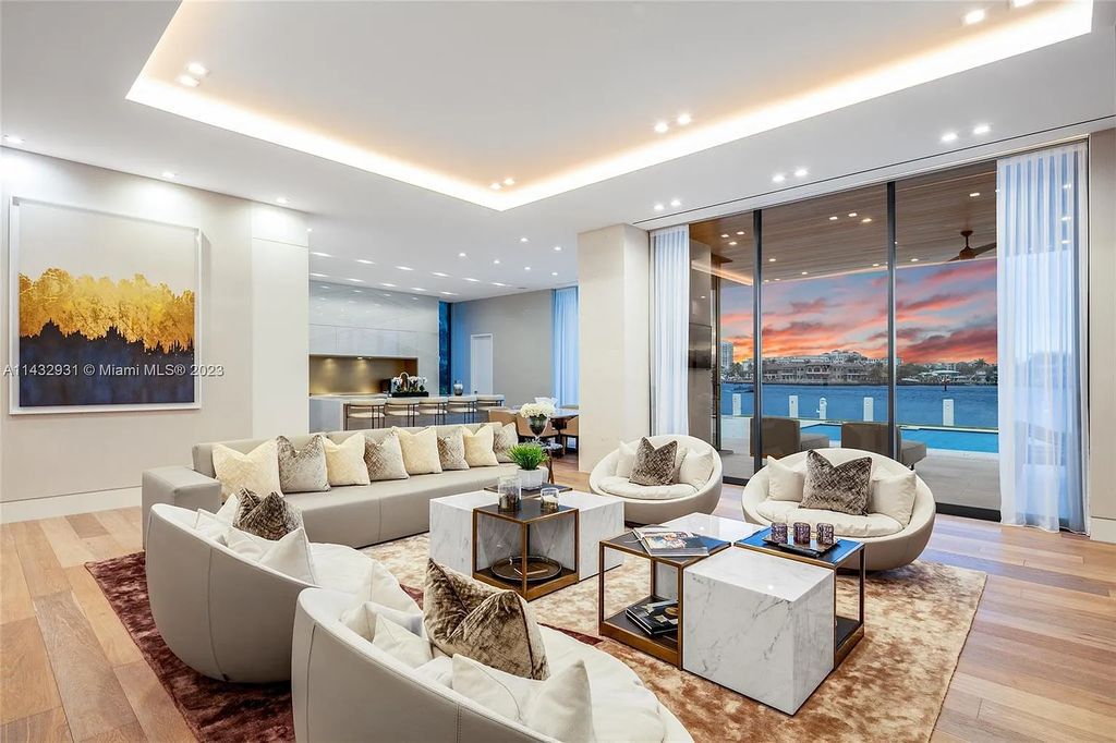 Luxury awaits in this 2021-built, 6-bed, 9-bath modern masterpiece in Fort Lauderdale's Harbor Beach gated community. Designed by Randall Stofft and crafted by Sarkela Corp, this 9,451 sq ft home features 120 ft of Intracoastal frontage, a lap pool, and outdoor kitchen.