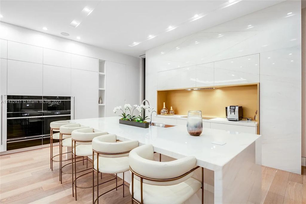 Luxury awaits in this 2021-built, 6-bed, 9-bath modern masterpiece in Fort Lauderdale's Harbor Beach gated community. Designed by Randall Stofft and crafted by Sarkela Corp, this 9,451 sq ft home features 120 ft of Intracoastal frontage, a lap pool, and outdoor kitchen.