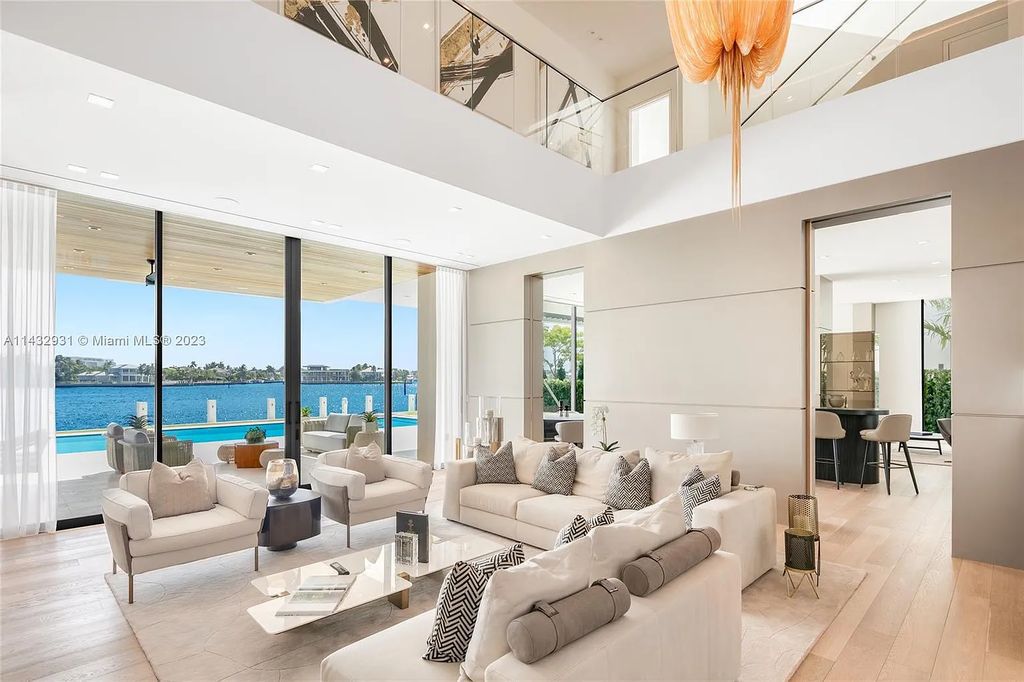 Luxury awaits in this 2021-built, 6-bed, 9-bath modern masterpiece in Fort Lauderdale's Harbor Beach gated community. Designed by Randall Stofft and crafted by Sarkela Corp, this 9,451 sq ft home features 120 ft of Intracoastal frontage, a lap pool, and outdoor kitchen.
