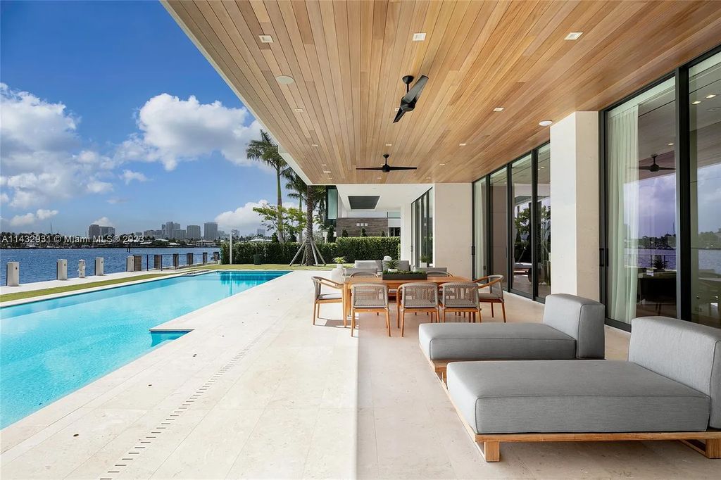 Luxury awaits in this 2021-built, 6-bed, 9-bath modern masterpiece in Fort Lauderdale's Harbor Beach gated community. Designed by Randall Stofft and crafted by Sarkela Corp, this 9,451 sq ft home features 120 ft of Intracoastal frontage, a lap pool, and outdoor kitchen.