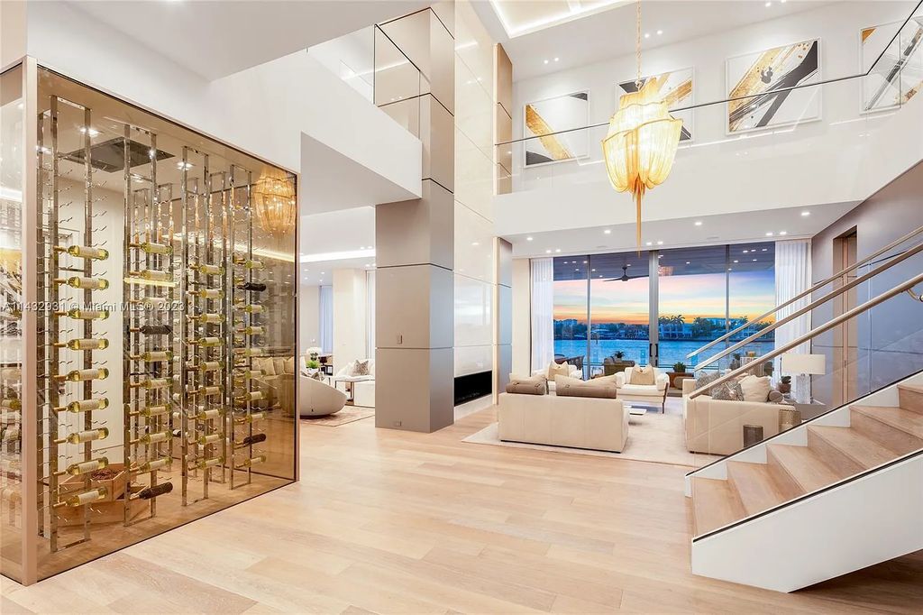 Luxury awaits in this 2021-built, 6-bed, 9-bath modern masterpiece in Fort Lauderdale's Harbor Beach gated community. Designed by Randall Stofft and crafted by Sarkela Corp, this 9,451 sq ft home features 120 ft of Intracoastal frontage, a lap pool, and outdoor kitchen.