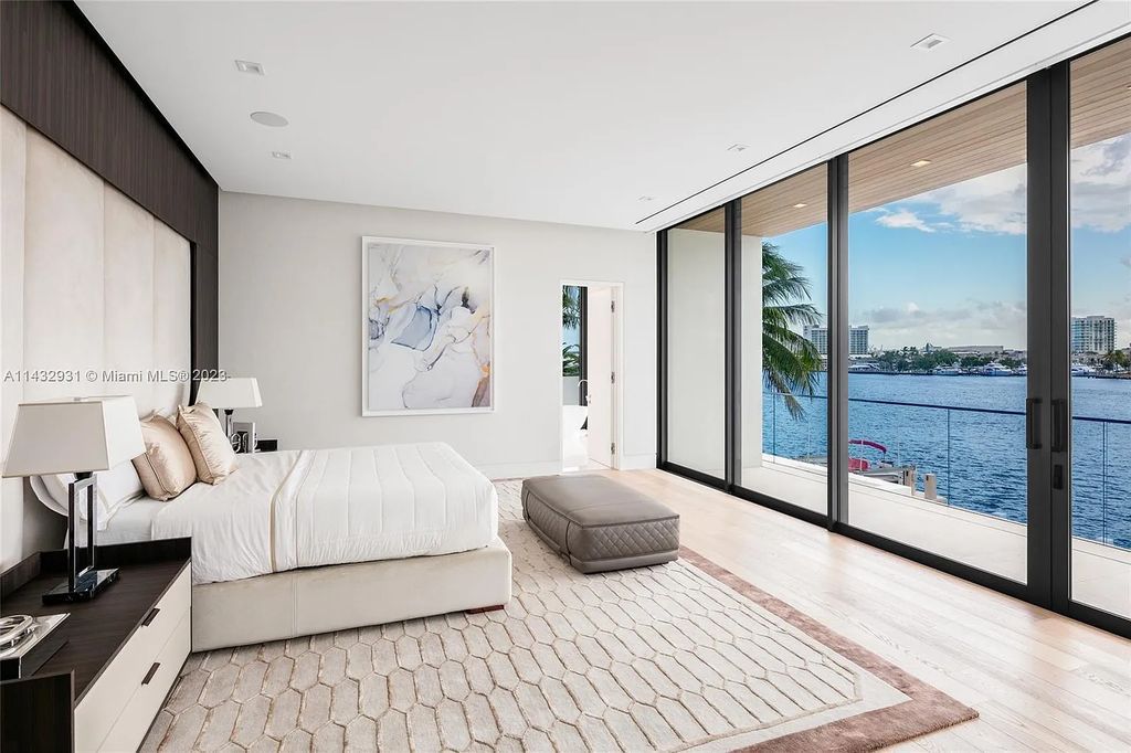 Luxury awaits in this 2021-built, 6-bed, 9-bath modern masterpiece in Fort Lauderdale's Harbor Beach gated community. Designed by Randall Stofft and crafted by Sarkela Corp, this 9,451 sq ft home features 120 ft of Intracoastal frontage, a lap pool, and outdoor kitchen.