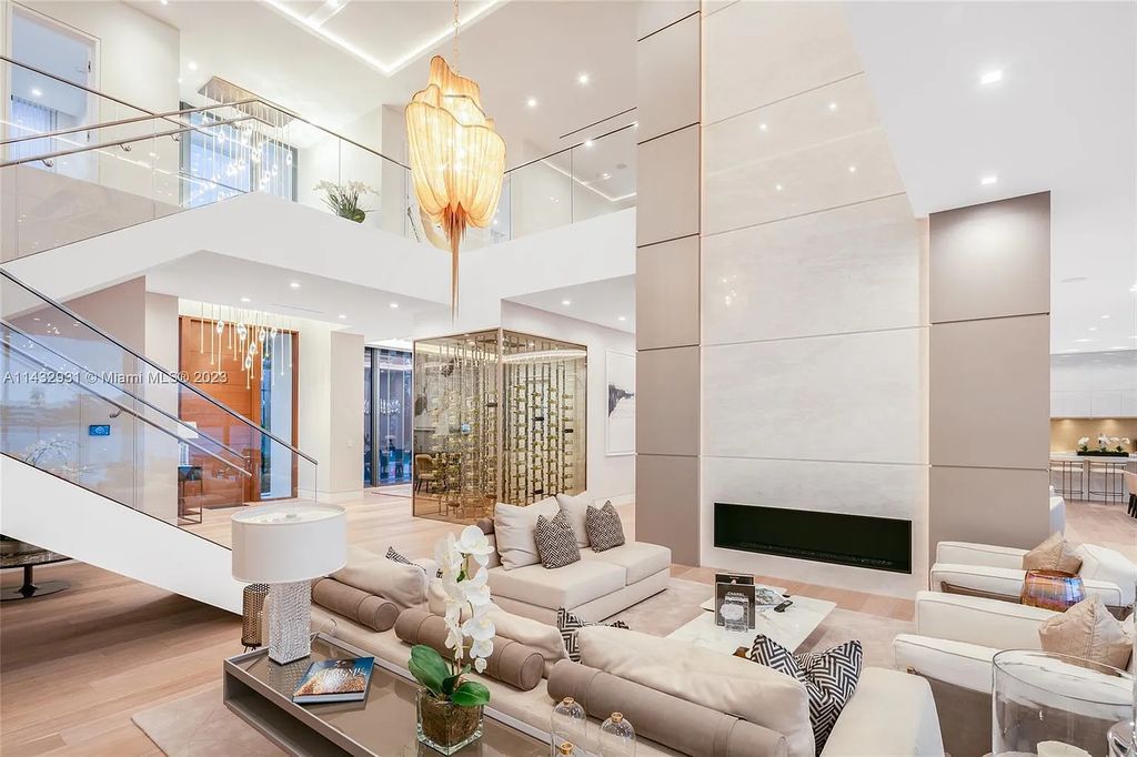 Luxury awaits in this 2021-built, 6-bed, 9-bath modern masterpiece in Fort Lauderdale's Harbor Beach gated community. Designed by Randall Stofft and crafted by Sarkela Corp, this 9,451 sq ft home features 120 ft of Intracoastal frontage, a lap pool, and outdoor kitchen.