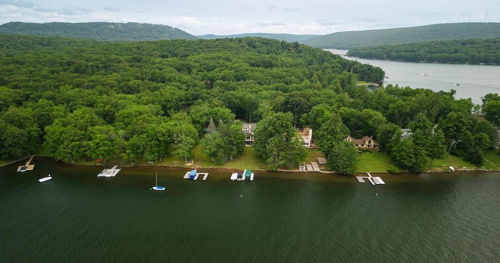 Extraordinary Lakefront Luxury: Stunning Stone and Stucco Home in Oakland, Maryland Offered at $3.95 Million