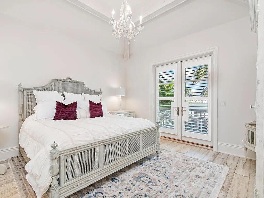 Discover your dream home at 1340 Caxambas Ct, Marco Island, Florida! This 5-bed, 5-bath luxury residence with a theater room boasts 5,007 sq ft of impeccable craftsmanship, situated on 0.59 acres with 248 ft of water frontage and a newer seawall, ensuring endless views and quick access to Caxambas Pass.