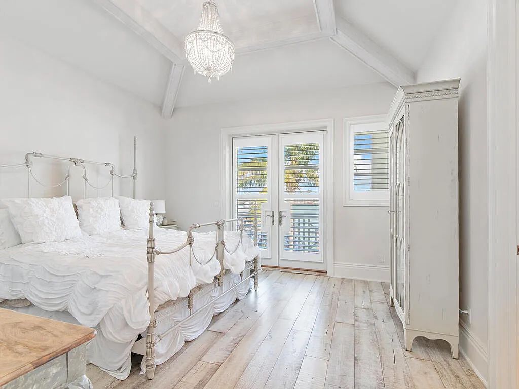 Discover your dream home at 1340 Caxambas Ct, Marco Island, Florida! This 5-bed, 5-bath luxury residence with a theater room boasts 5,007 sq ft of impeccable craftsmanship, situated on 0.59 acres with 248 ft of water frontage and a newer seawall, ensuring endless views and quick access to Caxambas Pass.