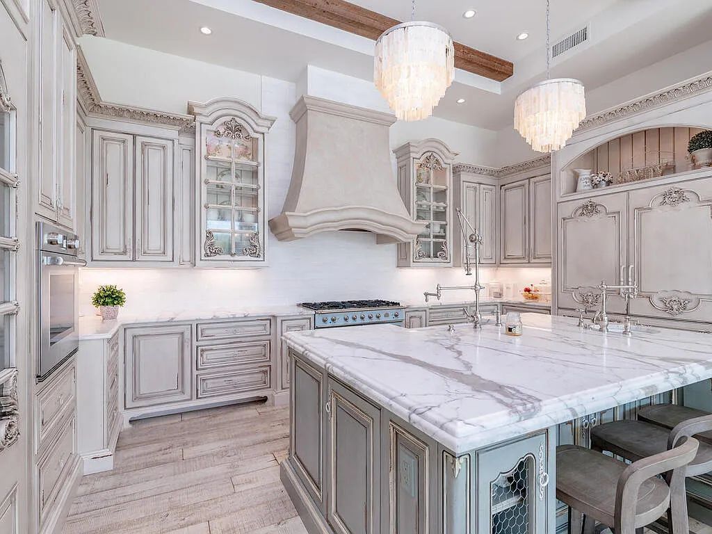 Discover your dream home at 1340 Caxambas Ct, Marco Island, Florida! This 5-bed, 5-bath luxury residence with a theater room boasts 5,007 sq ft of impeccable craftsmanship, situated on 0.59 acres with 248 ft of water frontage and a newer seawall, ensuring endless views and quick access to Caxambas Pass.