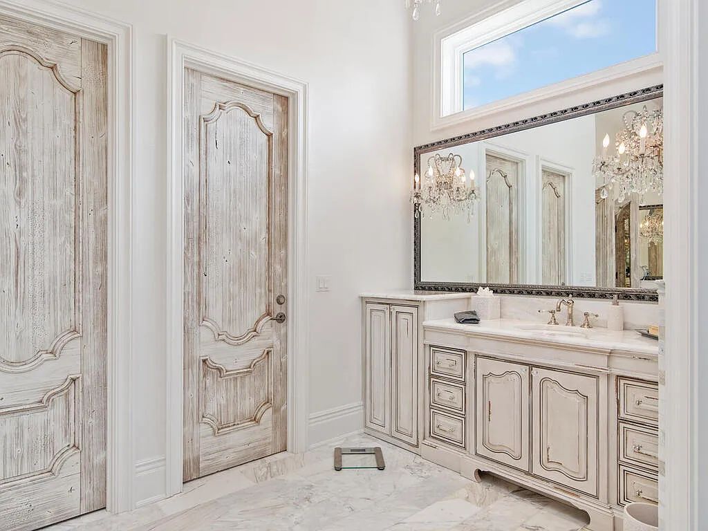 Discover your dream home at 1340 Caxambas Ct, Marco Island, Florida! This 5-bed, 5-bath luxury residence with a theater room boasts 5,007 sq ft of impeccable craftsmanship, situated on 0.59 acres with 248 ft of water frontage and a newer seawall, ensuring endless views and quick access to Caxambas Pass.