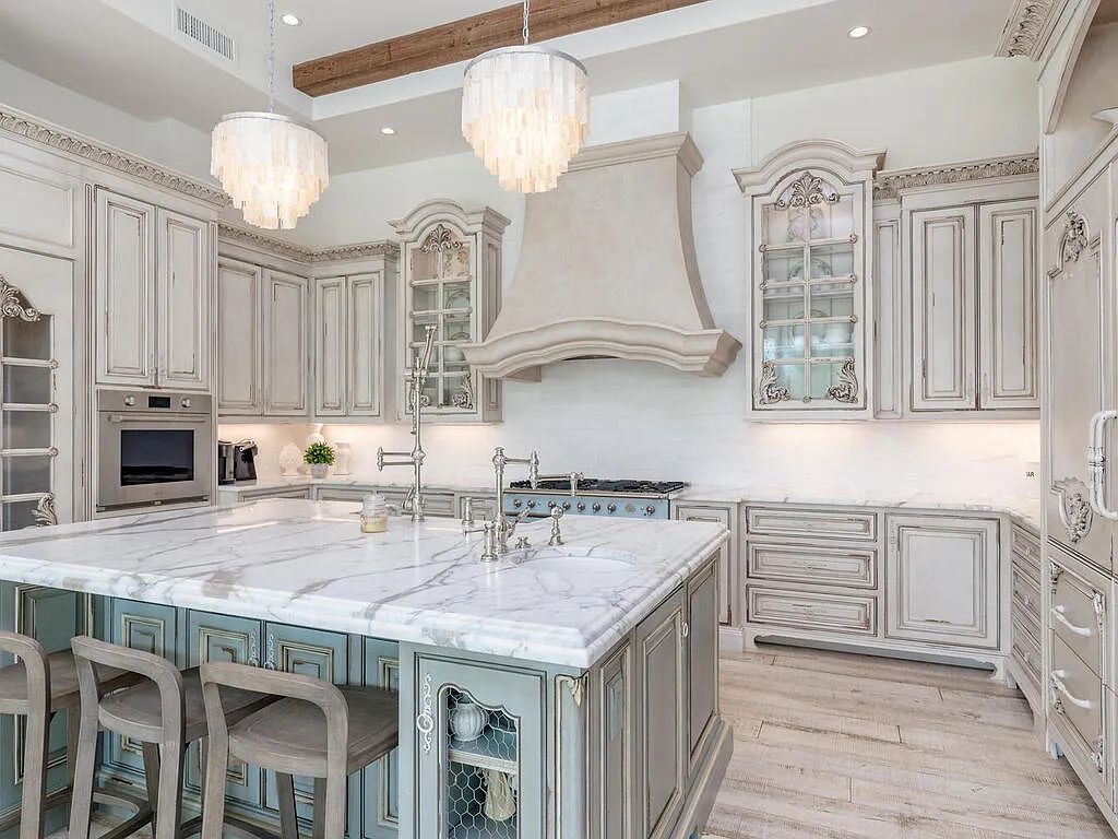 Discover your dream home at 1340 Caxambas Ct, Marco Island, Florida! This 5-bed, 5-bath luxury residence with a theater room boasts 5,007 sq ft of impeccable craftsmanship, situated on 0.59 acres with 248 ft of water frontage and a newer seawall, ensuring endless views and quick access to Caxambas Pass.