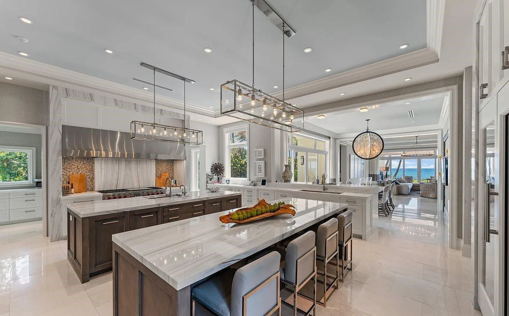 Nestled between the majestic Atlantic Ocean and the tranquil Intracoastal Waterway lies the extraordinary ''Villa Oceano Azul.'' This stunning estate is located in the prestigious estate section of Manalapan, Florida, and embodies the epitome of luxury living.