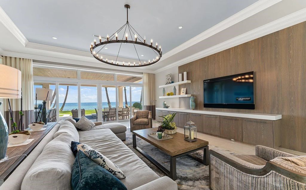 Nestled between the majestic Atlantic Ocean and the tranquil Intracoastal Waterway lies the extraordinary ''Villa Oceano Azul.'' This stunning estate is located in the prestigious estate section of Manalapan, Florida, and embodies the epitome of luxury living.