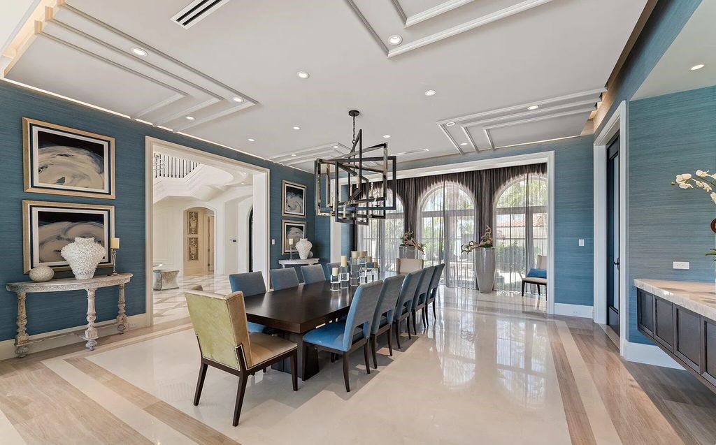 Nestled between the majestic Atlantic Ocean and the tranquil Intracoastal Waterway lies the extraordinary ''Villa Oceano Azul.'' This stunning estate is located in the prestigious estate section of Manalapan, Florida, and embodies the epitome of luxury living.