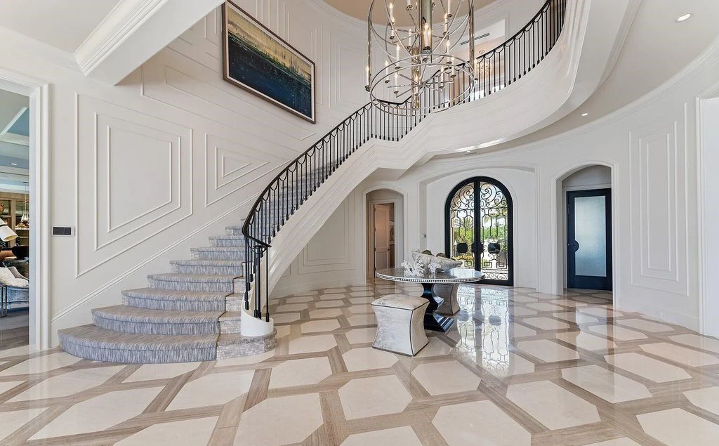 Nestled between the majestic Atlantic Ocean and the tranquil Intracoastal Waterway lies the extraordinary ''Villa Oceano Azul.'' This stunning estate is located in the prestigious estate section of Manalapan, Florida, and embodies the epitome of luxury living.
