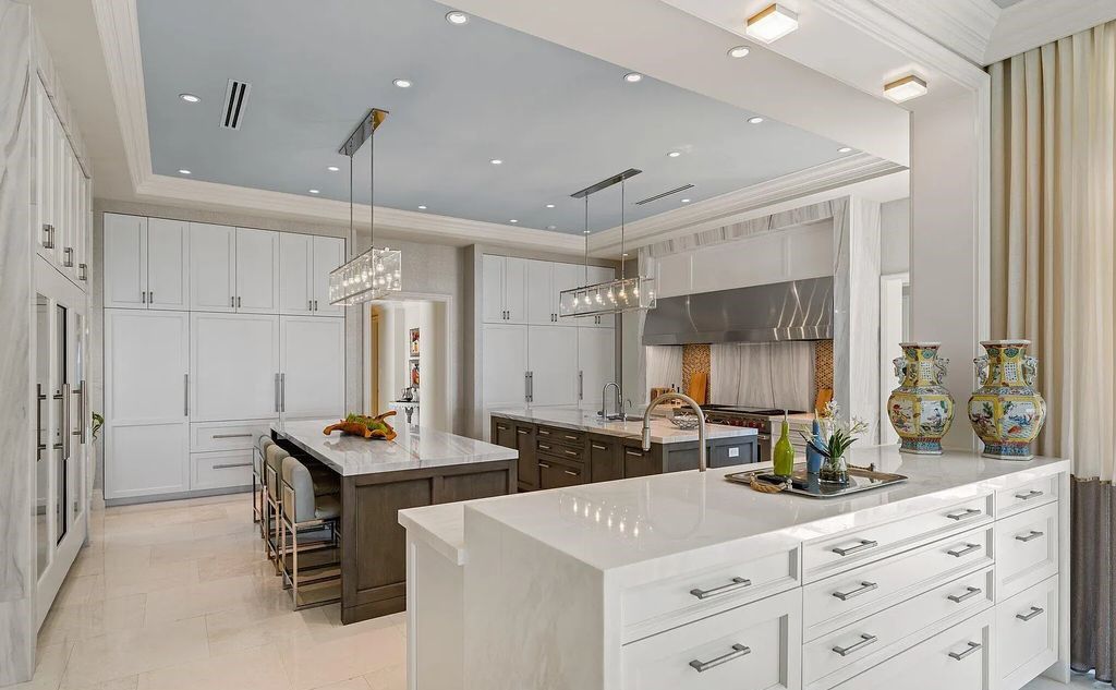 Nestled between the majestic Atlantic Ocean and the tranquil Intracoastal Waterway lies the extraordinary ''Villa Oceano Azul.'' This stunning estate is located in the prestigious estate section of Manalapan, Florida, and embodies the epitome of luxury living.