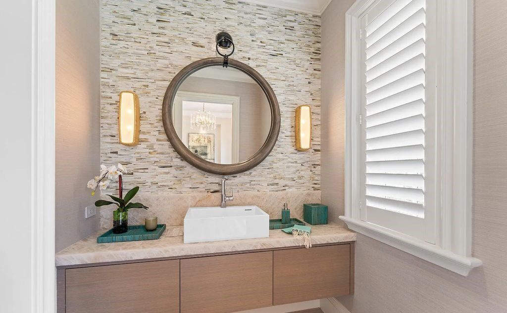Nestled between the majestic Atlantic Ocean and the tranquil Intracoastal Waterway lies the extraordinary ''Villa Oceano Azul.'' This stunning estate is located in the prestigious estate section of Manalapan, Florida, and embodies the epitome of luxury living.