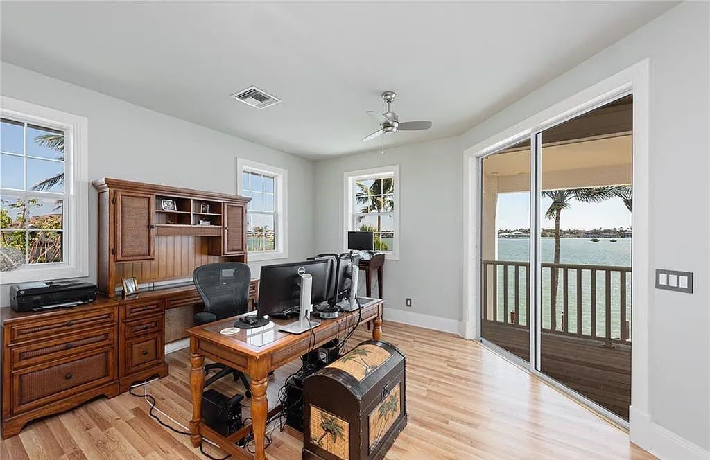 Nestled in Marco Island's prestigious Estate section, 581 Conover Ct is a waterfront gem offering 247' of direct access frontage on Roberts Bay with 11' elevation. This 2000-built Slocum & Christian home boasts an open - living concept, three bedrooms, three baths, and breathtaking water views from every room.