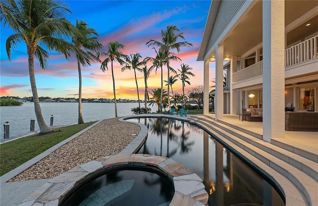 Nestled in Marco Island's prestigious Estate section, 581 Conover Ct is a waterfront gem offering 247' of direct access frontage on Roberts Bay with 11' elevation. This 2000-built Slocum & Christian home boasts an open - living concept, three bedrooms, three baths, and breathtaking water views from every room.
