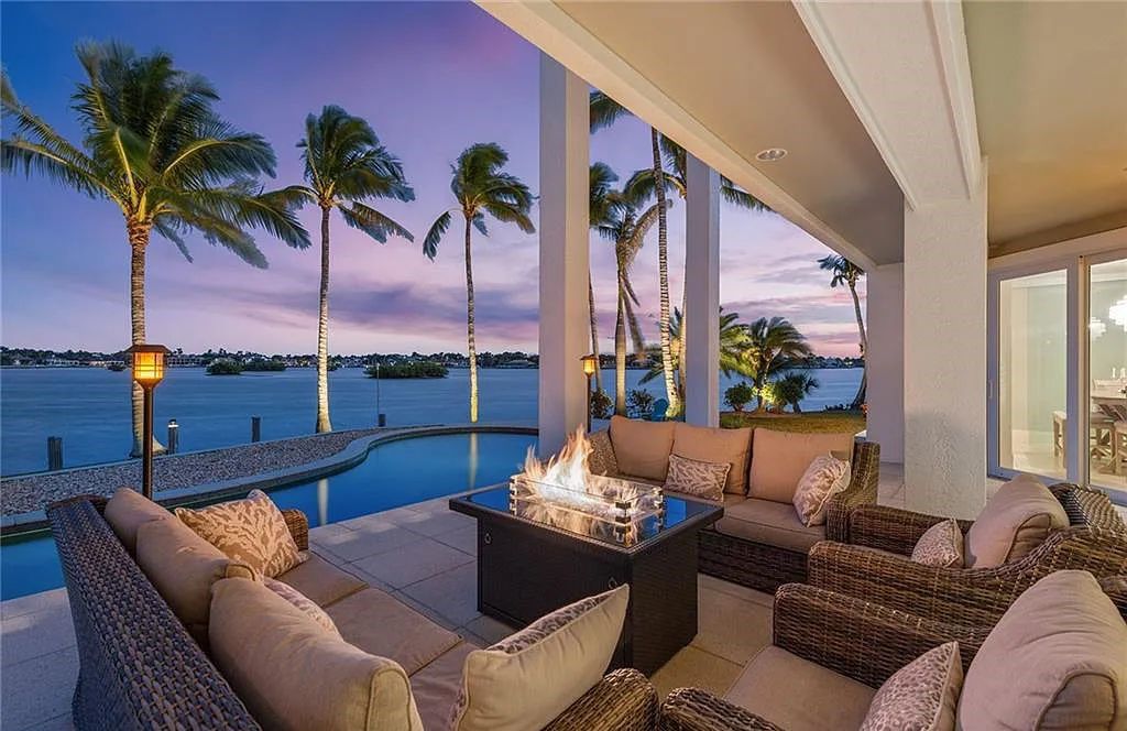 Nestled in Marco Island's prestigious Estate section, 581 Conover Ct is a waterfront gem offering 247' of direct access frontage on Roberts Bay with 11' elevation. This 2000-built Slocum & Christian home boasts an open - living concept, three bedrooms, three baths, and breathtaking water views from every room.