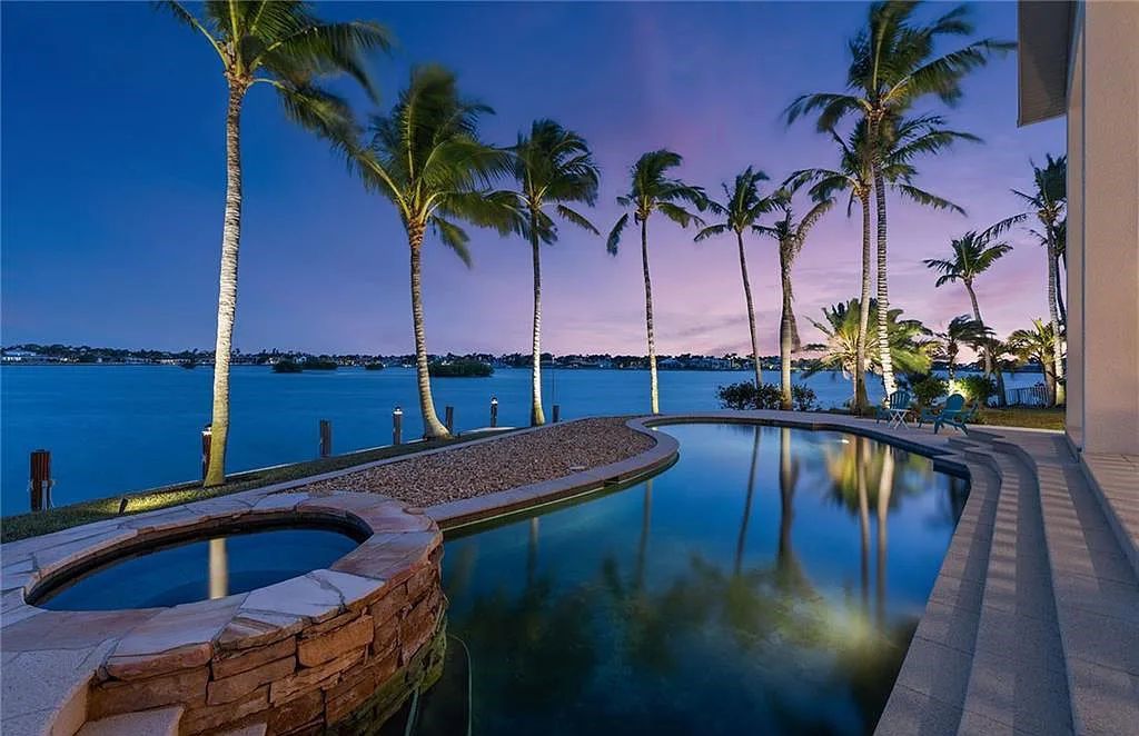 Nestled in Marco Island's prestigious Estate section, 581 Conover Ct is a waterfront gem offering 247' of direct access frontage on Roberts Bay with 11' elevation. This 2000-built Slocum & Christian home boasts an open - living concept, three bedrooms, three baths, and breathtaking water views from every room.