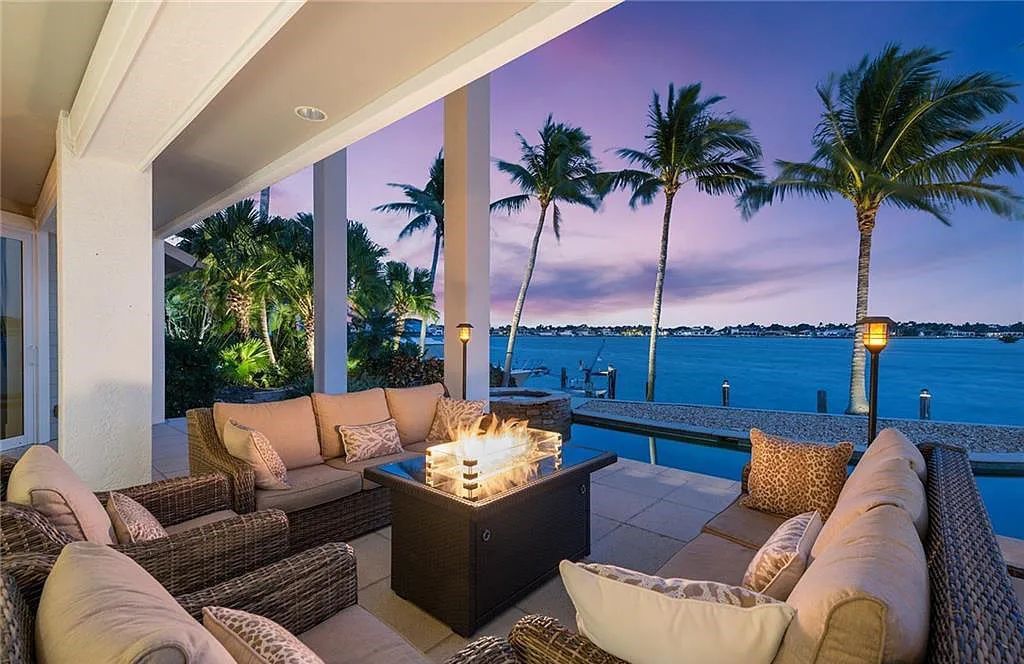 Nestled in Marco Island's prestigious Estate section, 581 Conover Ct is a waterfront gem offering 247' of direct access frontage on Roberts Bay with 11' elevation. This 2000-built Slocum & Christian home boasts an open - living concept, three bedrooms, three baths, and breathtaking water views from every room.