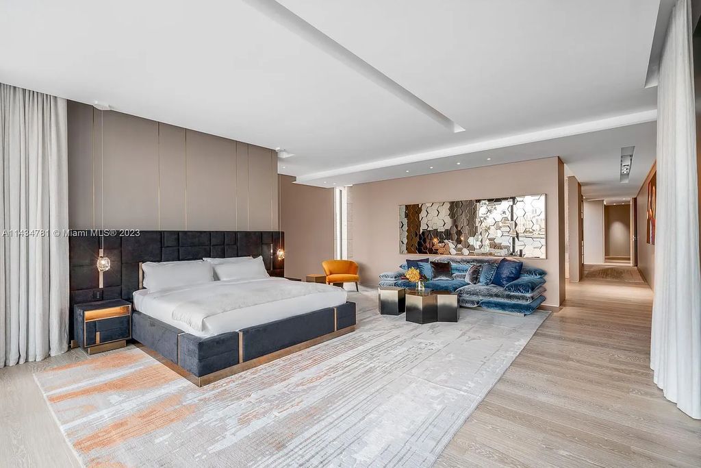 Nestled on the exclusive Star Island in Miami Beach, this 2019-built estate at 27 Star Island Drive is the epitome of luxury living. With 9 bedrooms and 12 bathrooms, the meticulously crafted interiors span nearly 23,000 square feet, showcasing a breathtaking 21-foot-high ceiling salon, a chef's dream kitchen, and multiple entertainment spaces, including two media rooms.