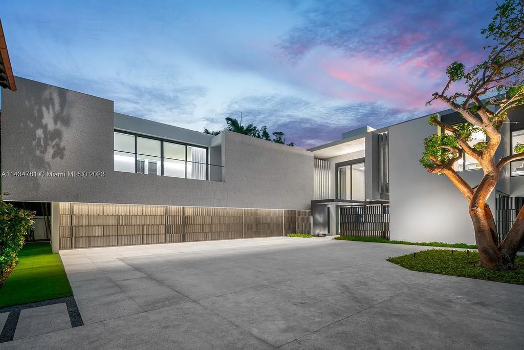 Nestled on the exclusive Star Island in Miami Beach, this 2019-built estate at 27 Star Island Drive is the epitome of luxury living. With 9 bedrooms and 12 bathrooms, the meticulously crafted interiors span nearly 23,000 square feet, showcasing a breathtaking 21-foot-high ceiling salon, a chef's dream kitchen, and multiple entertainment spaces, including two media rooms.
