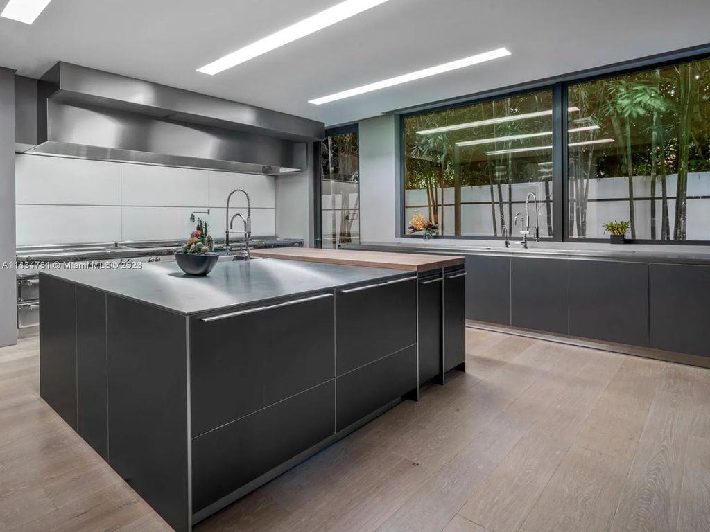 Nestled on the exclusive Star Island in Miami Beach, this 2019-built estate at 27 Star Island Drive is the epitome of luxury living. With 9 bedrooms and 12 bathrooms, the meticulously crafted interiors span nearly 23,000 square feet, showcasing a breathtaking 21-foot-high ceiling salon, a chef's dream kitchen, and multiple entertainment spaces, including two media rooms.