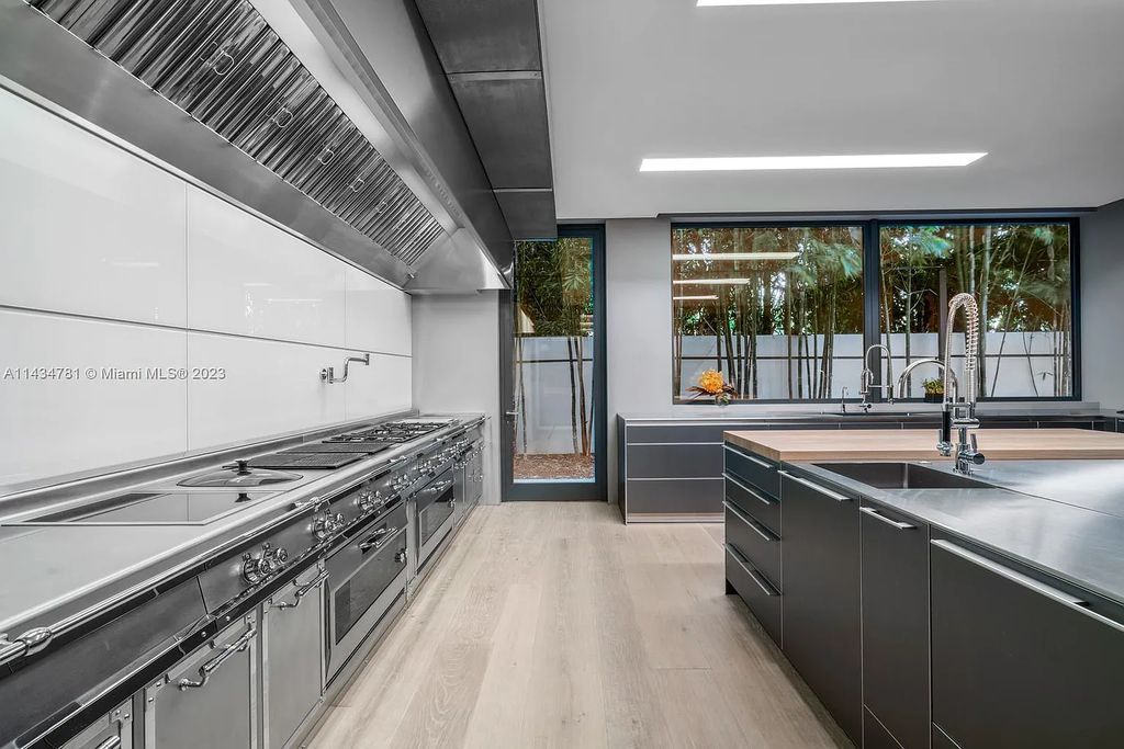 Nestled on the exclusive Star Island in Miami Beach, this 2019-built estate at 27 Star Island Drive is the epitome of luxury living. With 9 bedrooms and 12 bathrooms, the meticulously crafted interiors span nearly 23,000 square feet, showcasing a breathtaking 21-foot-high ceiling salon, a chef's dream kitchen, and multiple entertainment spaces, including two media rooms.