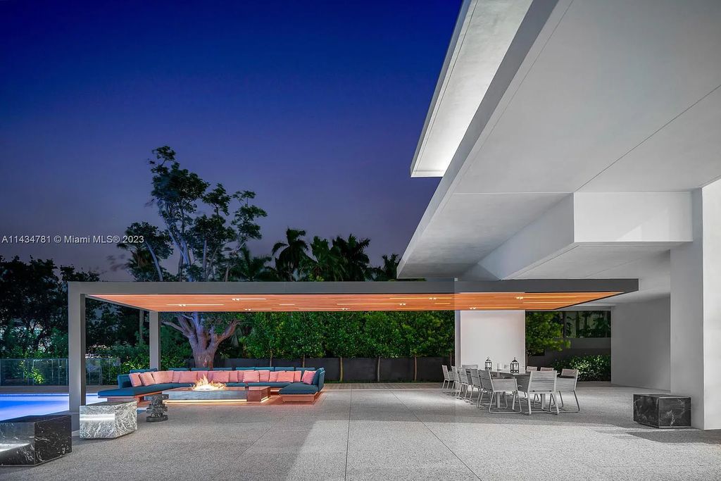 Nestled on the exclusive Star Island in Miami Beach, this 2019-built estate at 27 Star Island Drive is the epitome of luxury living. With 9 bedrooms and 12 bathrooms, the meticulously crafted interiors span nearly 23,000 square feet, showcasing a breathtaking 21-foot-high ceiling salon, a chef's dream kitchen, and multiple entertainment spaces, including two media rooms.