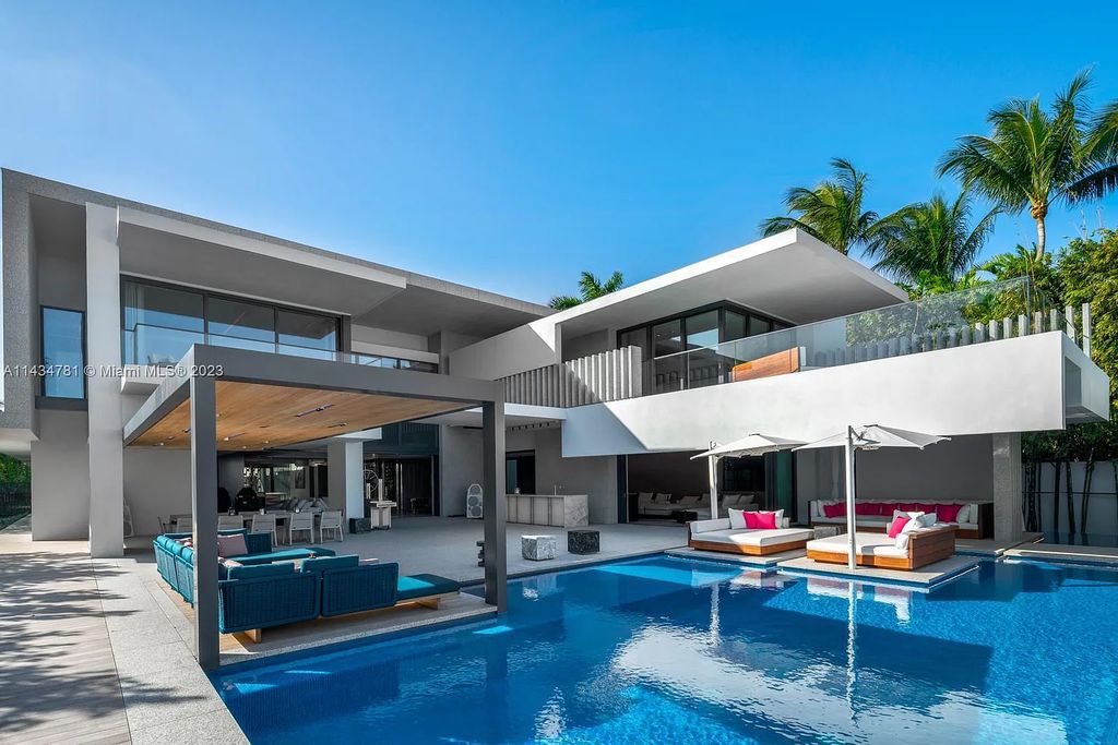 Nestled on the exclusive Star Island in Miami Beach, this 2019-built estate at 27 Star Island Drive is the epitome of luxury living. With 9 bedrooms and 12 bathrooms, the meticulously crafted interiors span nearly 23,000 square feet, showcasing a breathtaking 21-foot-high ceiling salon, a chef's dream kitchen, and multiple entertainment spaces, including two media rooms.