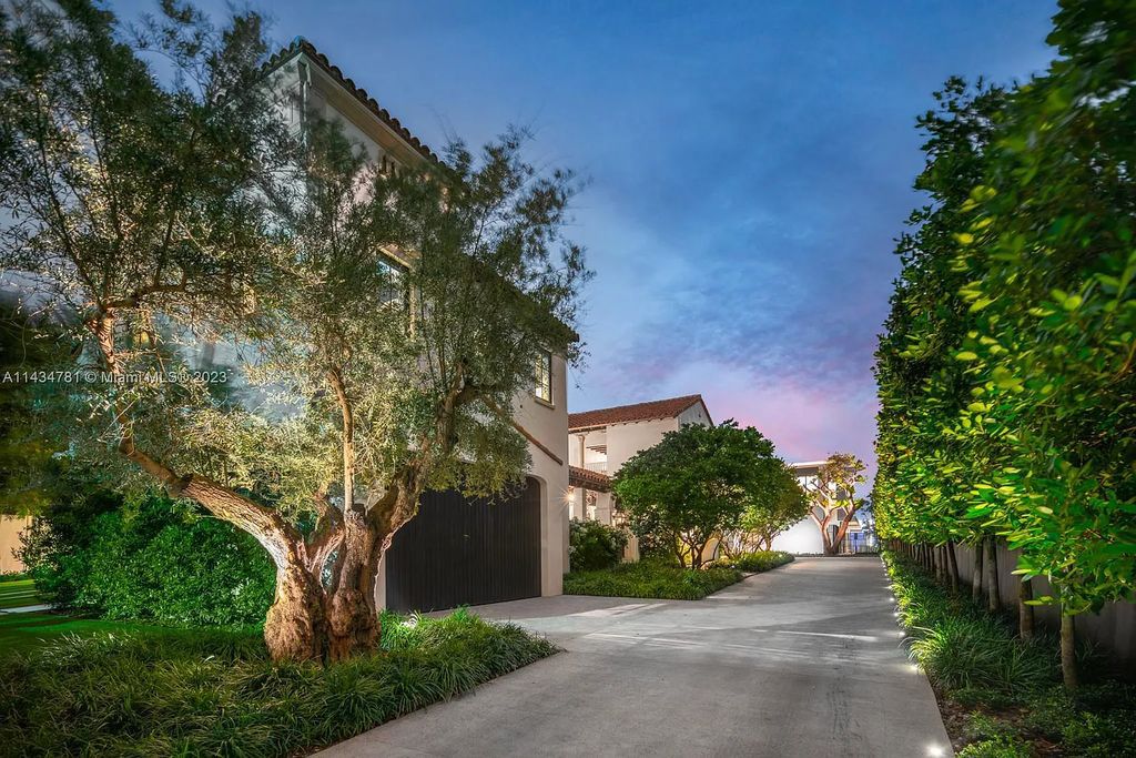 Nestled on the exclusive Star Island in Miami Beach, this 2019-built estate at 27 Star Island Drive is the epitome of luxury living. With 9 bedrooms and 12 bathrooms, the meticulously crafted interiors span nearly 23,000 square feet, showcasing a breathtaking 21-foot-high ceiling salon, a chef's dream kitchen, and multiple entertainment spaces, including two media rooms.