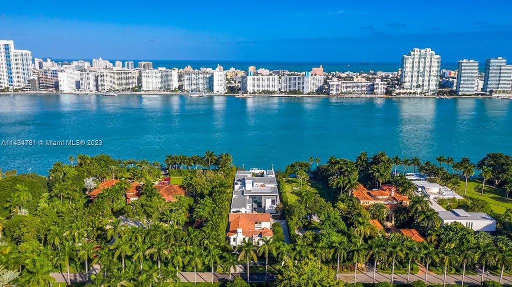 Nestled on the exclusive Star Island in Miami Beach, this 2019-built estate at 27 Star Island Drive is the epitome of luxury living. With 9 bedrooms and 12 bathrooms, the meticulously crafted interiors span nearly 23,000 square feet, showcasing a breathtaking 21-foot-high ceiling salon, a chef's dream kitchen, and multiple entertainment spaces, including two media rooms.