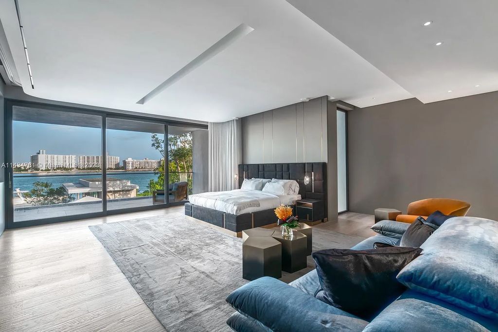 Nestled on the exclusive Star Island in Miami Beach, this 2019-built estate at 27 Star Island Drive is the epitome of luxury living. With 9 bedrooms and 12 bathrooms, the meticulously crafted interiors span nearly 23,000 square feet, showcasing a breathtaking 21-foot-high ceiling salon, a chef's dream kitchen, and multiple entertainment spaces, including two media rooms.