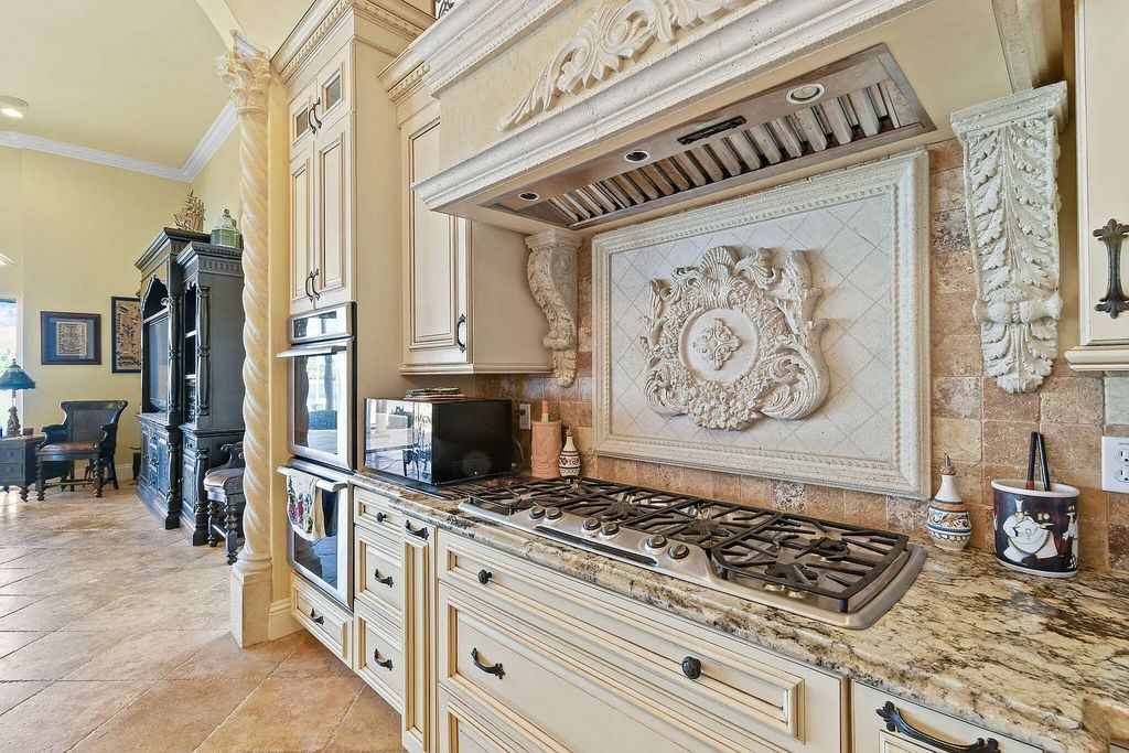 Discover unparalleled waterfront living at 19709 Harbor Road, Jupiter, Florida. This exquisite 3-bedroom, 4-bathroom estate, spanning 5,319 square feet on a 0.37-acre lot, presents breathtaking Intracoastal Waterway views.