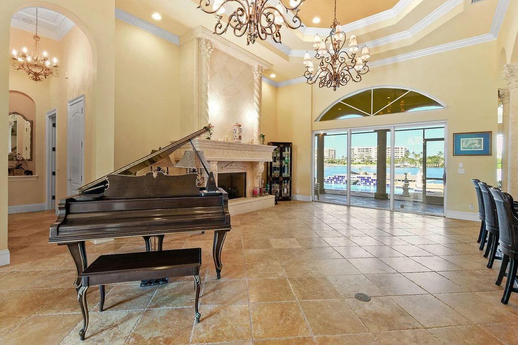Discover unparalleled waterfront living at 19709 Harbor Road, Jupiter, Florida. This exquisite 3-bedroom, 4-bathroom estate, spanning 5,319 square feet on a 0.37-acre lot, presents breathtaking Intracoastal Waterway views.