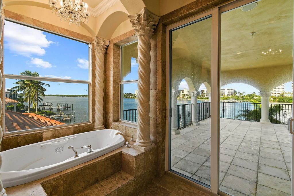 Discover unparalleled waterfront living at 19709 Harbor Road, Jupiter, Florida. This exquisite 3-bedroom, 4-bathroom estate, spanning 5,319 square feet on a 0.37-acre lot, presents breathtaking Intracoastal Waterway views.