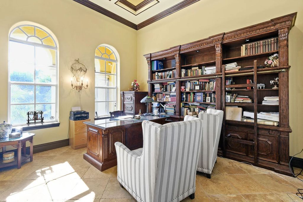 Discover unparalleled waterfront living at 19709 Harbor Road, Jupiter, Florida. This exquisite 3-bedroom, 4-bathroom estate, spanning 5,319 square feet on a 0.37-acre lot, presents breathtaking Intracoastal Waterway views.