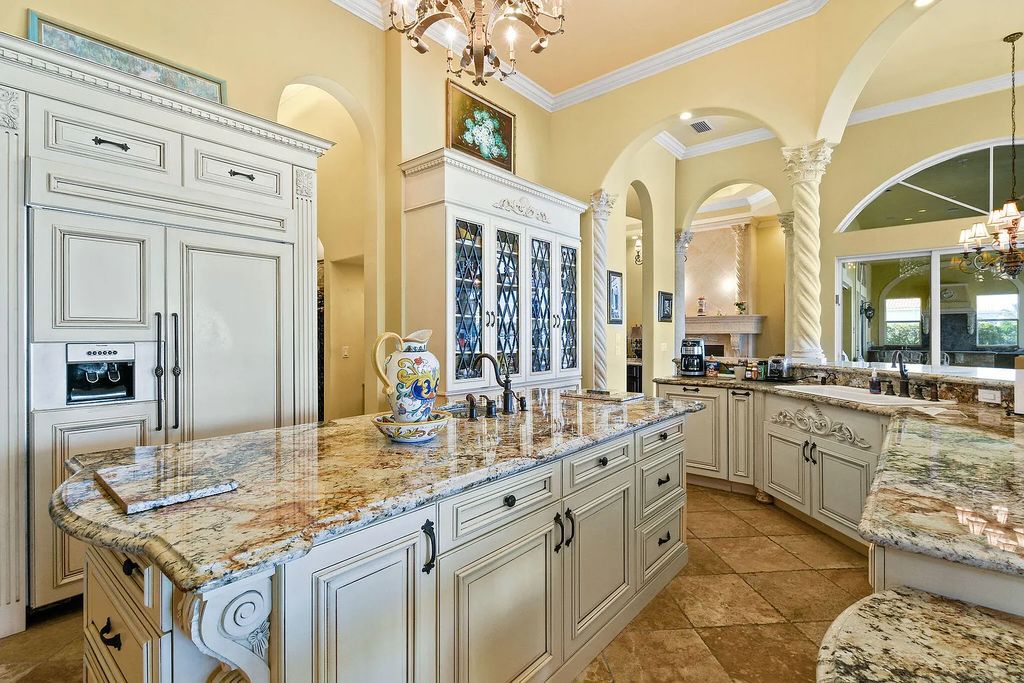 Discover unparalleled waterfront living at 19709 Harbor Road, Jupiter, Florida. This exquisite 3-bedroom, 4-bathroom estate, spanning 5,319 square feet on a 0.37-acre lot, presents breathtaking Intracoastal Waterway views.
