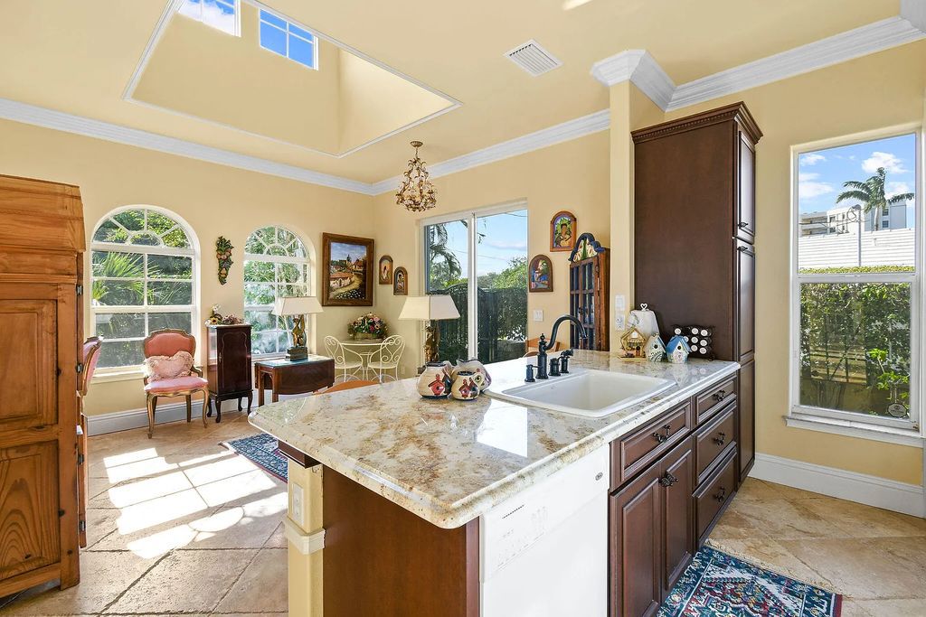 Discover unparalleled waterfront living at 19709 Harbor Road, Jupiter, Florida. This exquisite 3-bedroom, 4-bathroom estate, spanning 5,319 square feet on a 0.37-acre lot, presents breathtaking Intracoastal Waterway views.