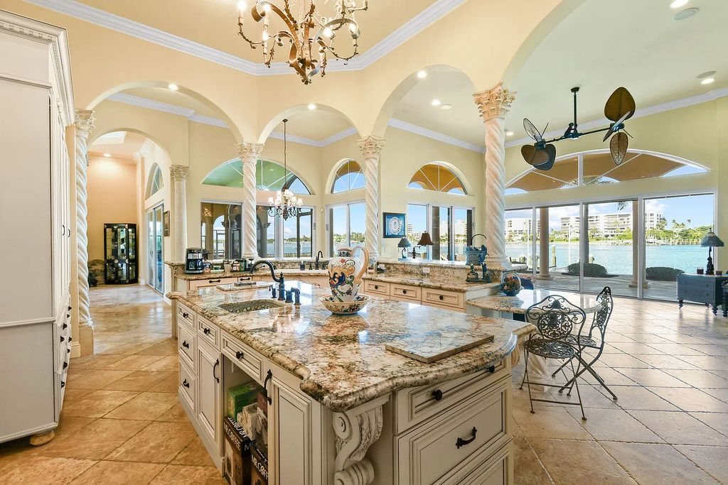 Discover unparalleled waterfront living at 19709 Harbor Road, Jupiter, Florida. This exquisite 3-bedroom, 4-bathroom estate, spanning 5,319 square feet on a 0.37-acre lot, presents breathtaking Intracoastal Waterway views.
