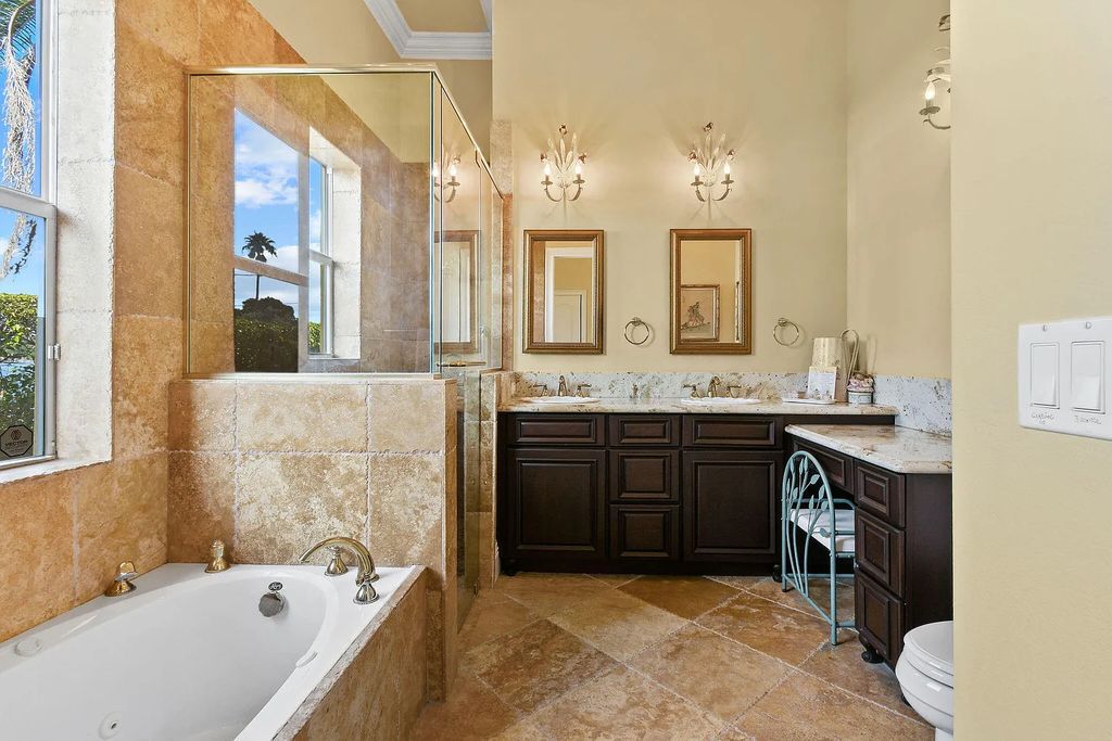 Discover unparalleled waterfront living at 19709 Harbor Road, Jupiter, Florida. This exquisite 3-bedroom, 4-bathroom estate, spanning 5,319 square feet on a 0.37-acre lot, presents breathtaking Intracoastal Waterway views.