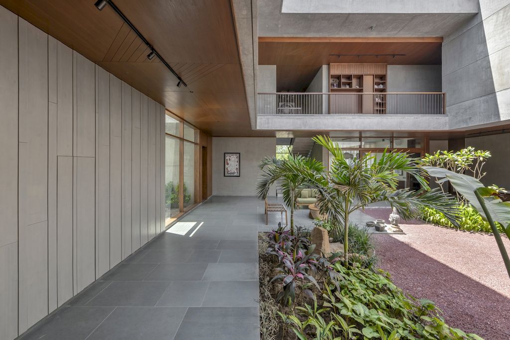 The Monolithic House Features Open Green Spaces by MODO Designs 20